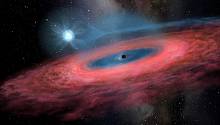 Гигантская чёрная дыра удивила астрономов 