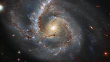 Хаббл заснял галактику с необычно ярким рукавом
