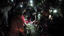 На Сулавеси освободили крокодила, «запертого» в шине от мотоцикла
