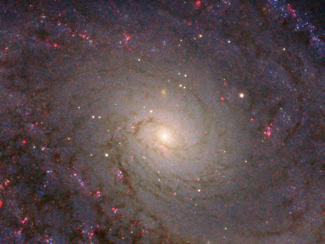 Хаббл снял почти идеальную спиральную галактику