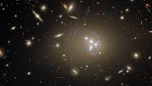 NASA опубликовало снимок скопления, в котором может быть много тёмной материи
